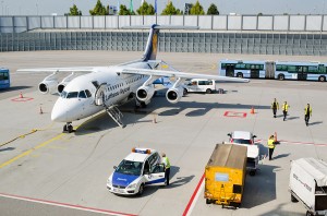 Lufthansa Cityline - Avro RJ85 - parked on the apron at Munich Airport.