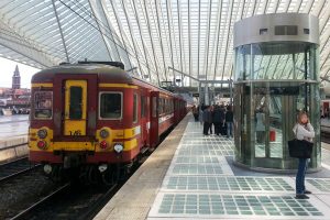 Old train in Belgium in modern Liège train station