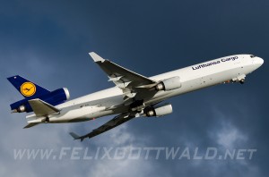 Lufthansa Cargo - McDonnell Douglas MD-11F - D-ALCL - departing Frankfurt with a big dark cloud in the background