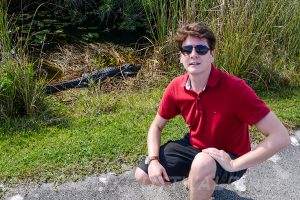 Felix Gottwald with alligator in Everglades NP