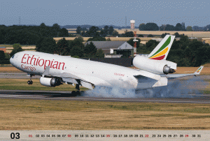 The March motive of the MD-11 Calendar 2015 shows an Ethiopian Cargo MD-11F performing a smoky touch-down.