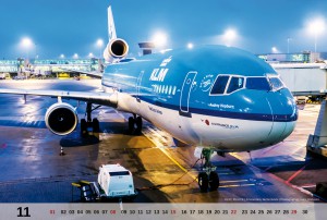 The November motive of the MD-11 Calendar 2015 is KLM PH-KCA at the gate in Amsterdam during night.