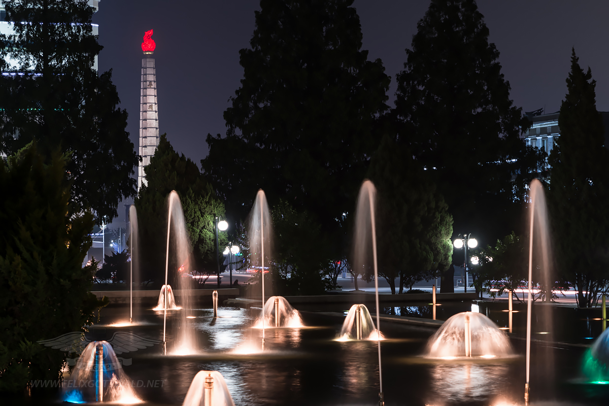 Pyongyang at night - Mansudae fountain park, view on Juche Tower